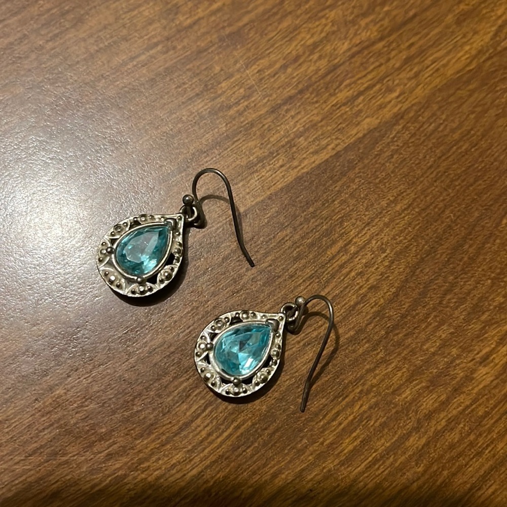 Gold/bronze tone with light blue stone earrings